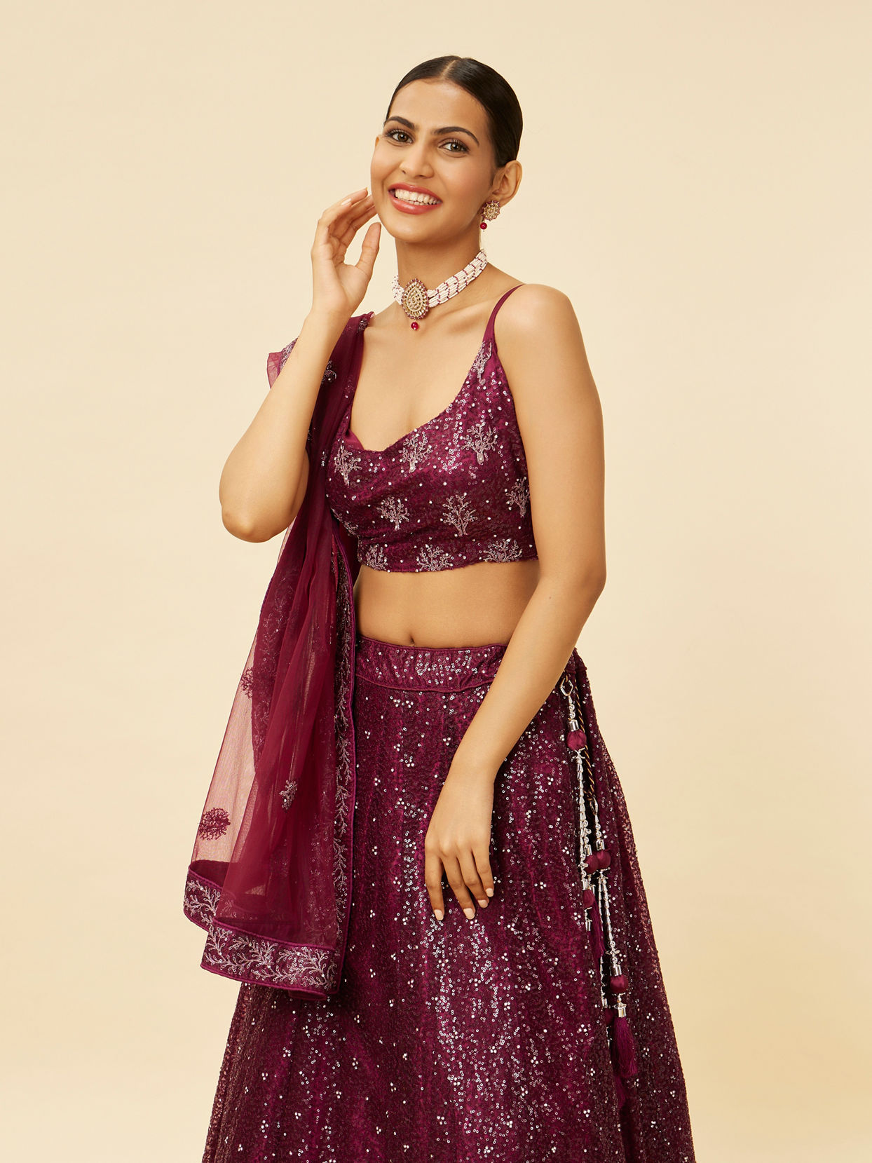 alt message - Mohey Women Windsor Wine Heavy Sequined Lehenga image number 1