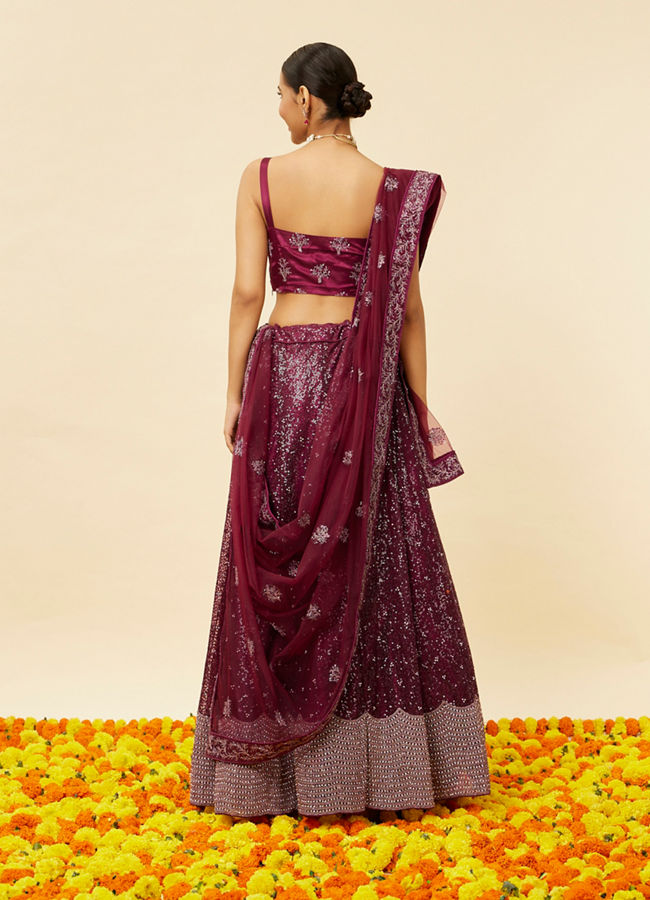 alt message - Mohey Women Windsor Wine Heavy Sequined Lehenga image number 4