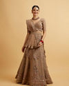 alt message - Mohey Women Golden Fawn Sitara Embroidered Bridal Lehenga image number 0