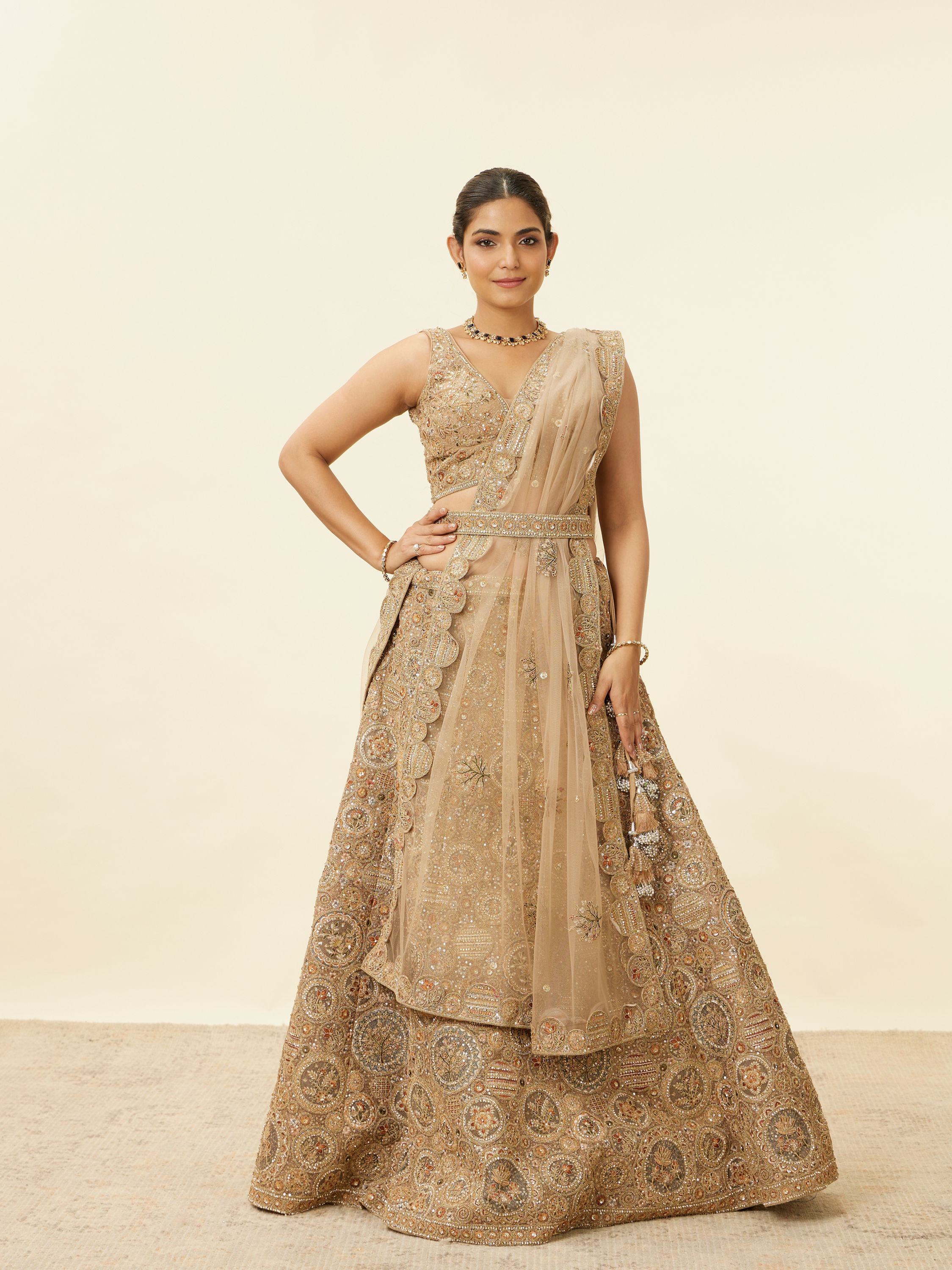 Mohey Women Biscuit Beige Moti Work Bridal Lehenga