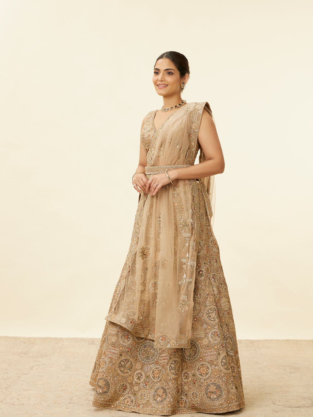 Mohey Women Biscuit Beige Moti Work Bridal Lehenga