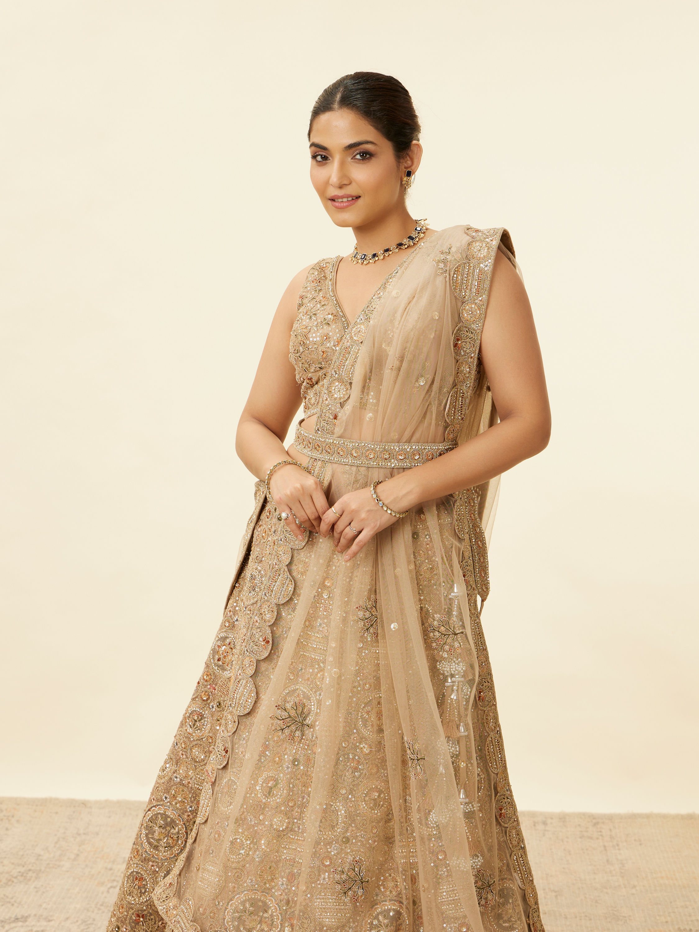 Mohey Women Biscuit Beige Moti Work Bridal Lehenga