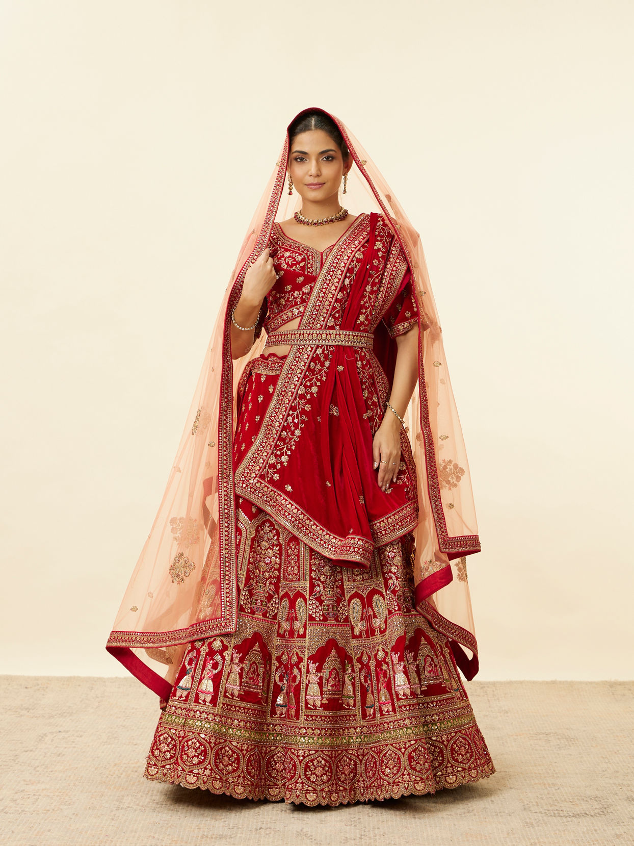 alt message - Mohey Women Intricate Embroidered Red Bridal Lehenga image number 0