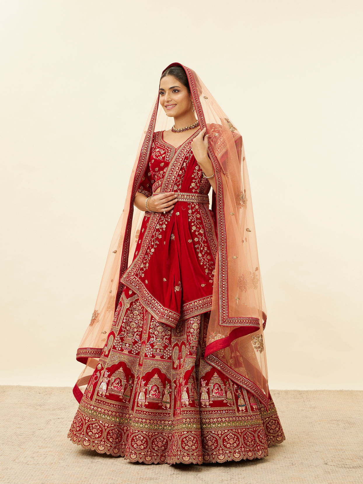 alt message - Mohey Women Intricate Embroidered Red Bridal Lehenga image number 2