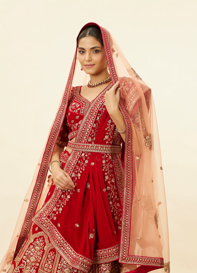 alt message - Mohey Women Intricate Embroidered Red Bridal Lehenga image number 1