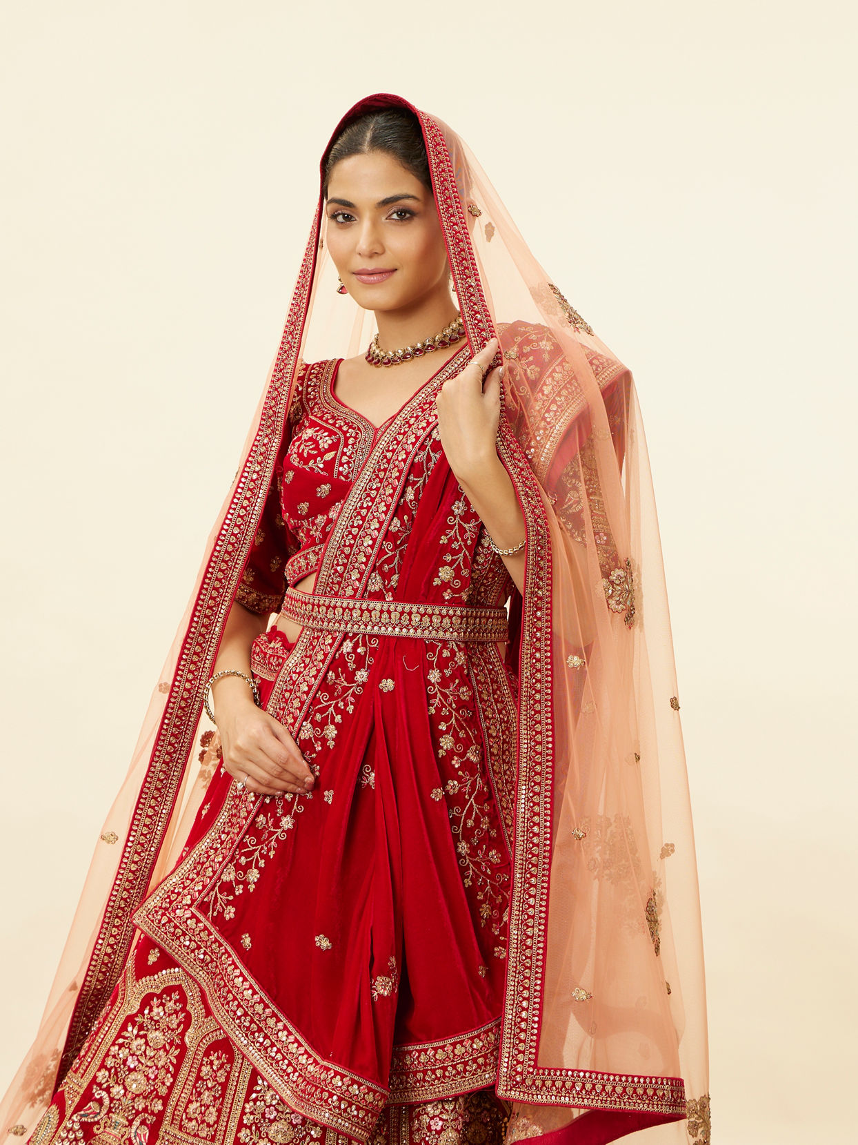 alt message - Mohey Women Intricate Embroidered Red Bridal Lehenga image number 1