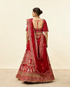 alt message - Mohey Women Intricate Embroidered Red Bridal Lehenga image number 4