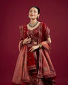 Mohey Women Intricate Embroidered Red Bridal Lehenga