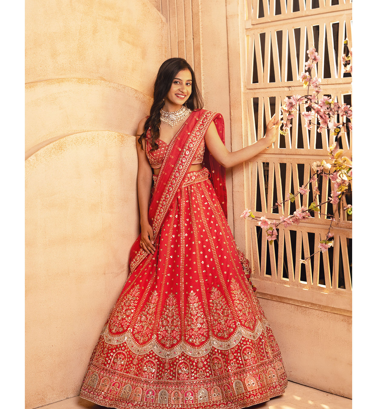 Mohey Women Classic Red Floral Aari Embroidered Bridal Lehenga with Buta Motifs image number 0