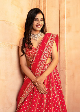 Mohey Women Classic Red Floral Aari Embroidered Bridal Lehenga with Buta Motifs