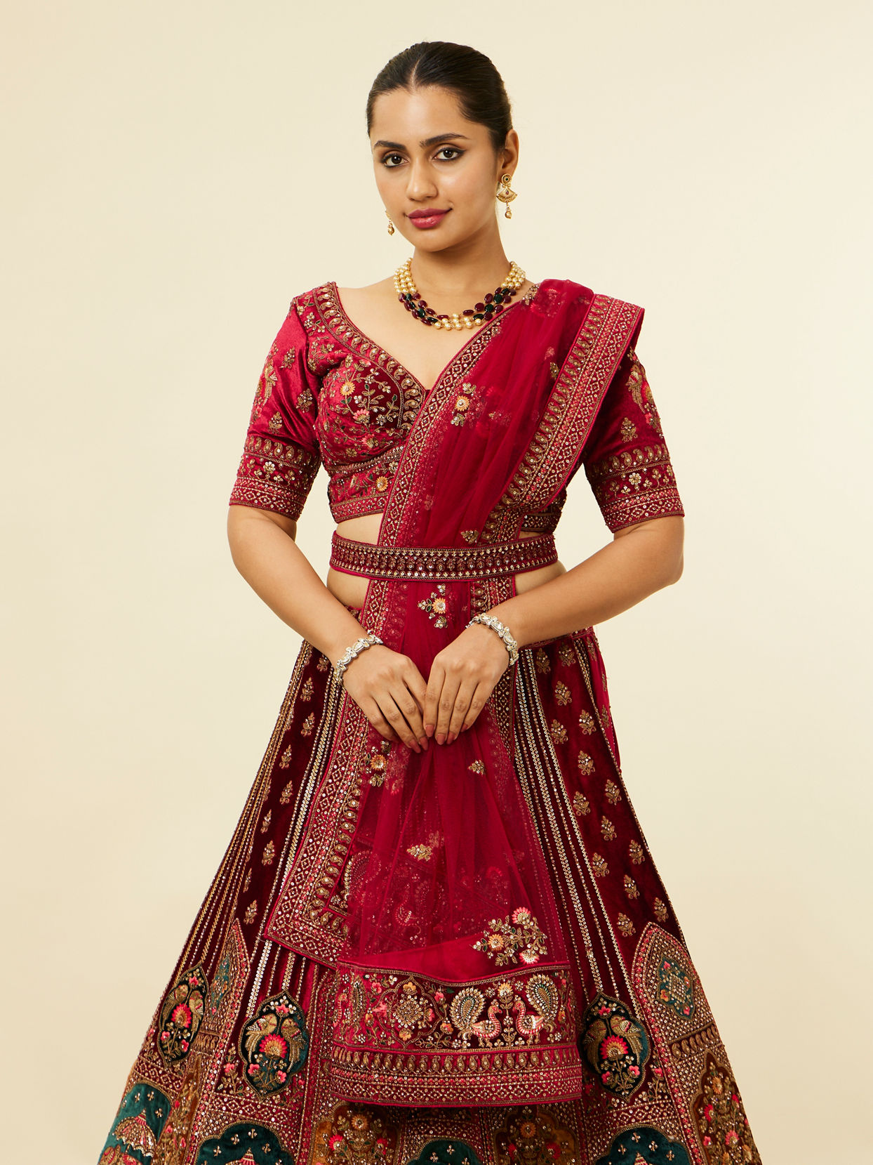 alt message - Mohey Women Maroon Floral Aari Embroidered Lehenga image number 1