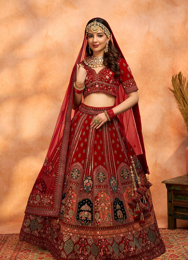 alt message - Mohey Women Dark Red Velvet Crop Top Lehenga image number 0