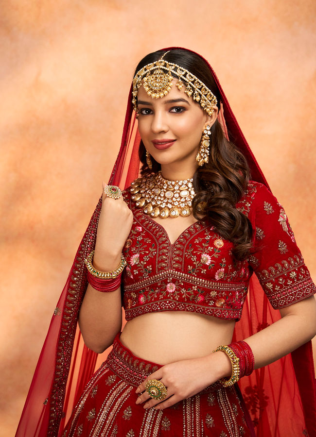 alt message - Mohey Women Dark Red Velvet Crop Top Lehenga image number 1