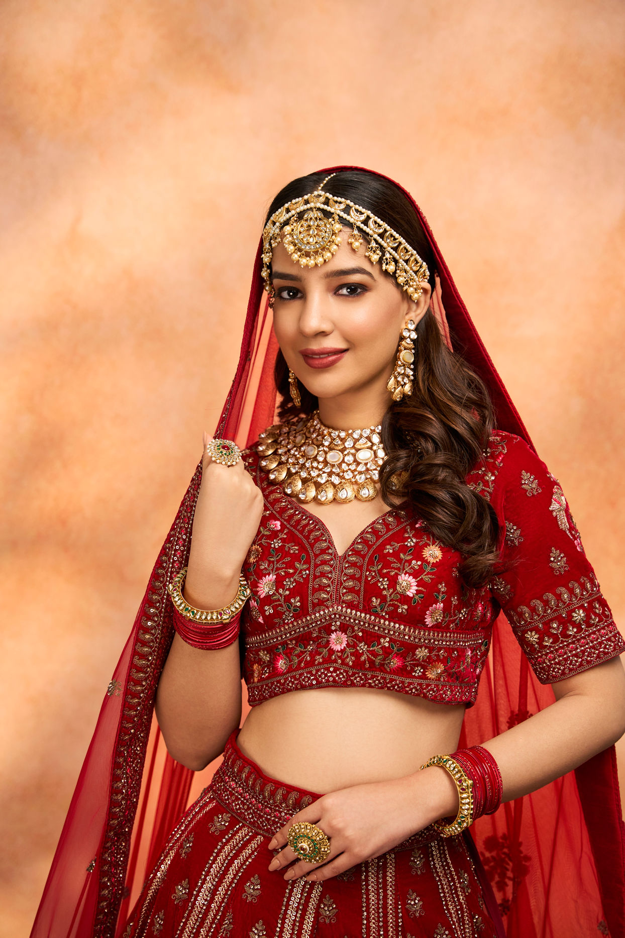 alt message - Mohey Women Dark Red Velvet Crop Top Lehenga image number 1