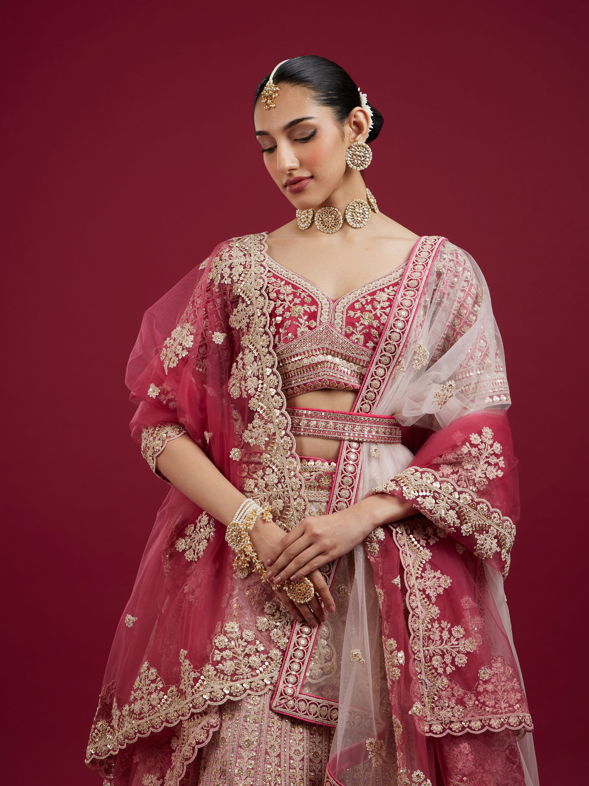 Mohey Women Coral And Light Pink Aari Embroidered Lehenga with Mirror Work