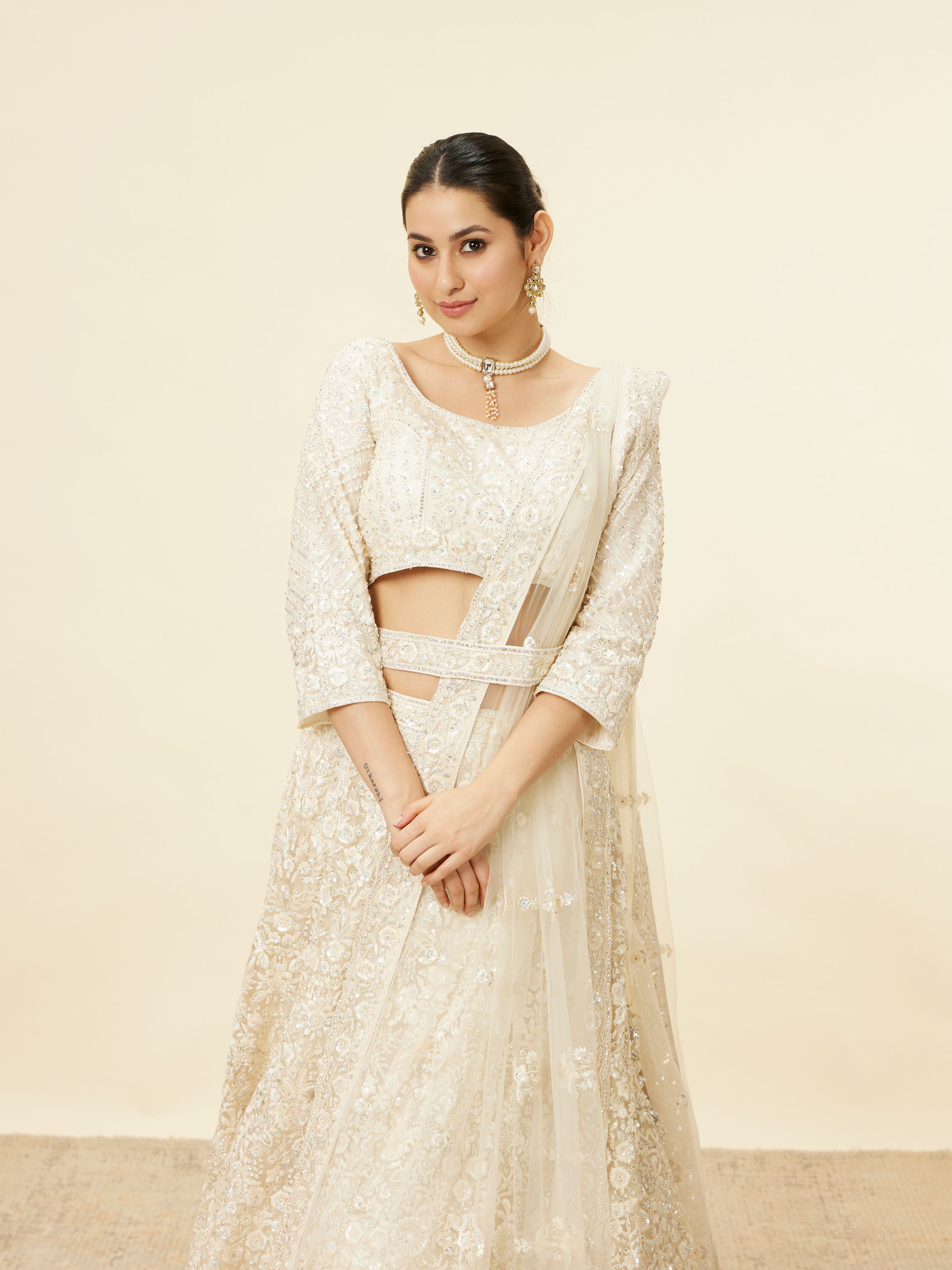 Mohey Women Daisy Cream Floral Embroidered Sequinned Bridal Lehenga