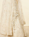 Mohey Women Daisy Cream Floral Embroidered Sequinned Bridal Lehenga