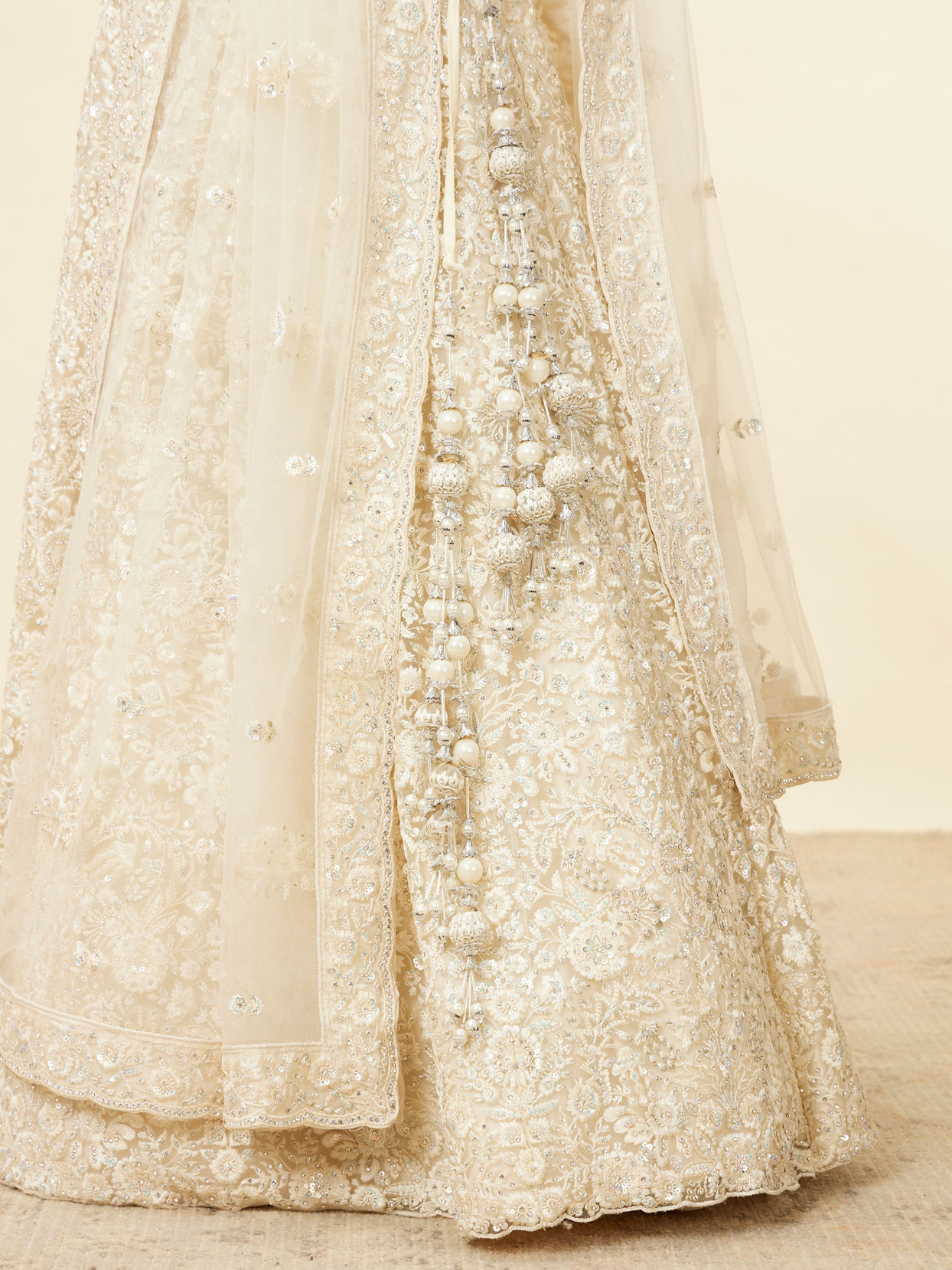 Mohey Women Daisy Cream Floral Embroidered Sequinned Bridal Lehenga
