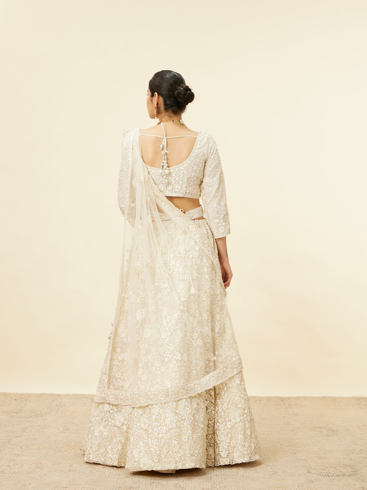 Mohey Women Daisy Cream Floral Embroidered Sequinned Bridal Lehenga