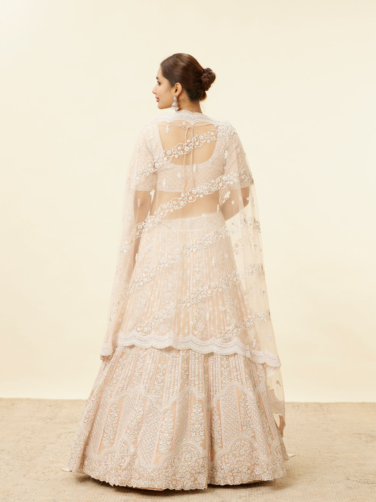 alt message - Mohey Women Peach Fuzz Sequin and Bead Work Lehenga image number 4