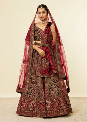 alt message - Mohey Women Maroon Paisley Floral Embroidered Bridal Lehenga image number 0