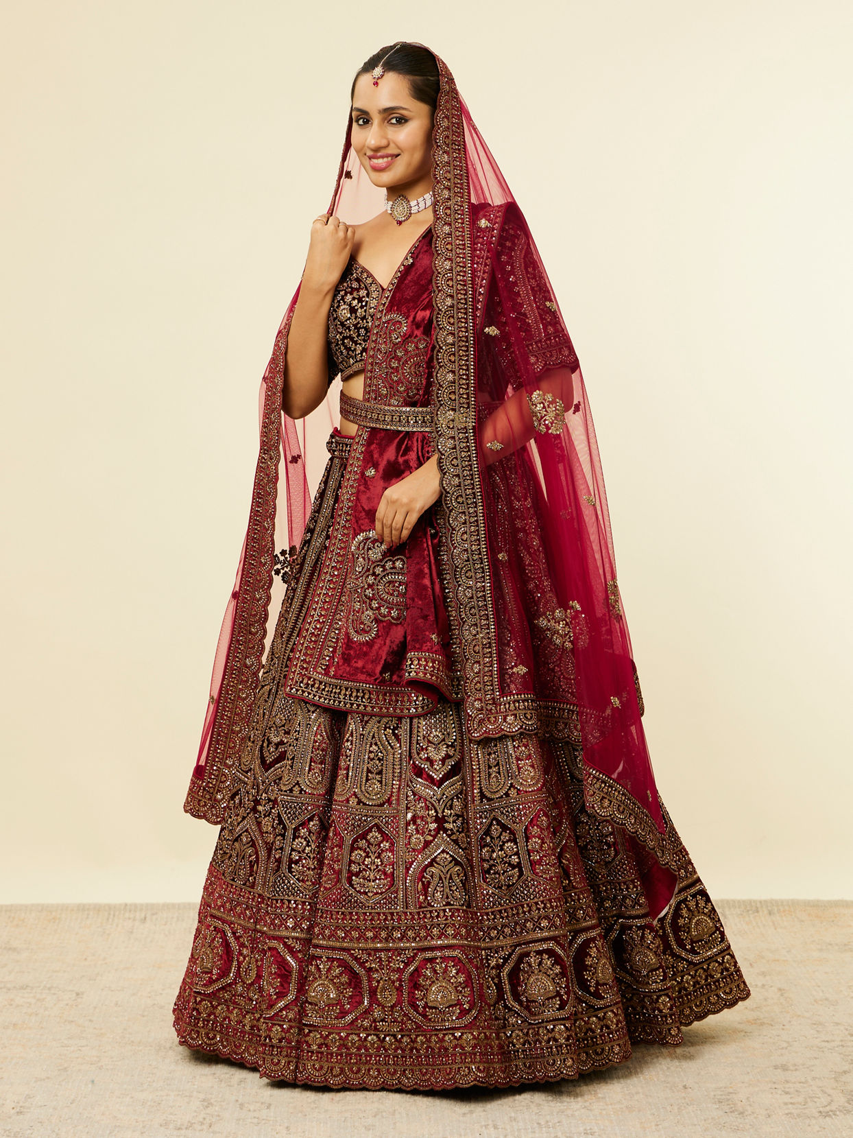 alt message - Mohey Women Maroon Paisley Floral Embroidered Bridal Lehenga image number 2