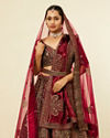 alt message - Mohey Women Maroon Paisley Floral Embroidered Bridal Lehenga image number 1