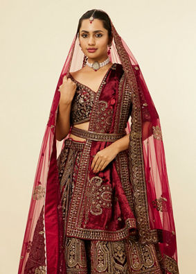 alt message - Mohey Women Maroon Paisley Floral Embroidered Bridal Lehenga image number 1