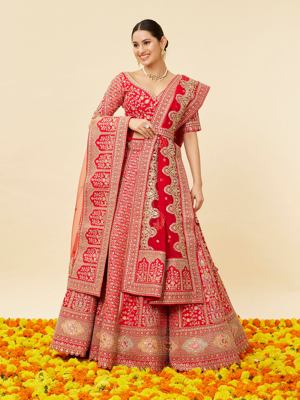 Mohey Women Tomato Red Bel Buti Embroidered Bridal Lehenga image number 0