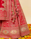 Mohey Women Tomato Red Bel Buti Embroidered Bridal Lehenga image number 3