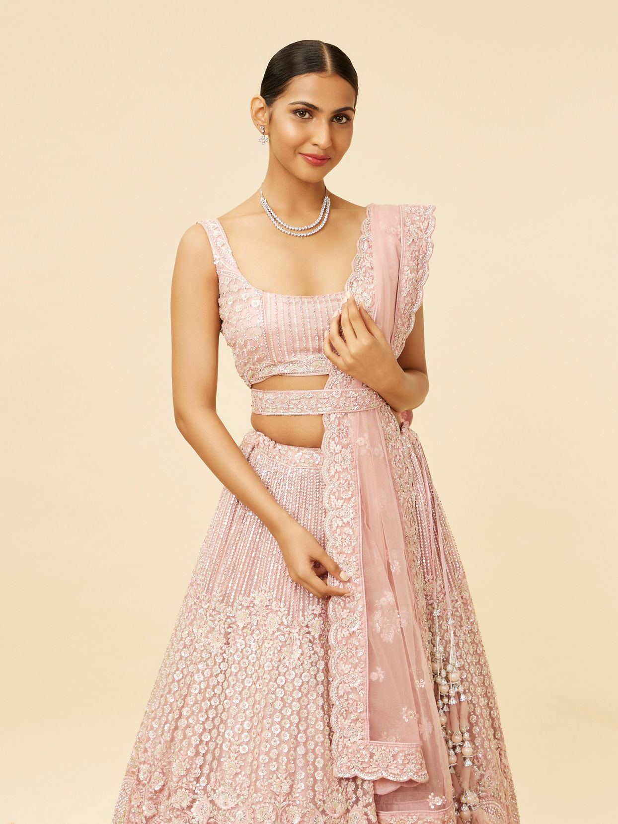 Mohey Women Blush Pink Rhinestone and Sitara Embroidered Bridal Lehenga