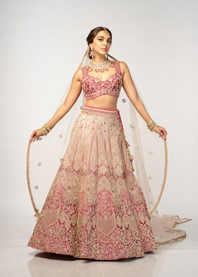 alt message - Mohey Women Coral Pink Bel Buti Embroidered Bridal Lehenga image number 0