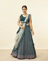 alt message - Mohey Women Teal Blue Harlequin Pattern Moti Work Lehenga image number 0