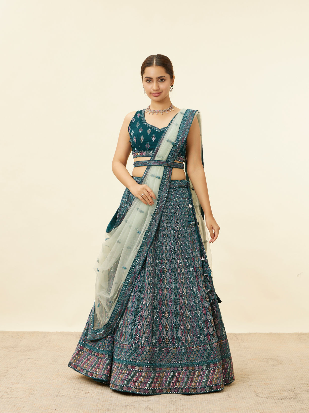 alt message - Mohey Women Teal Blue Harlequin Pattern Moti Work Lehenga image number 0