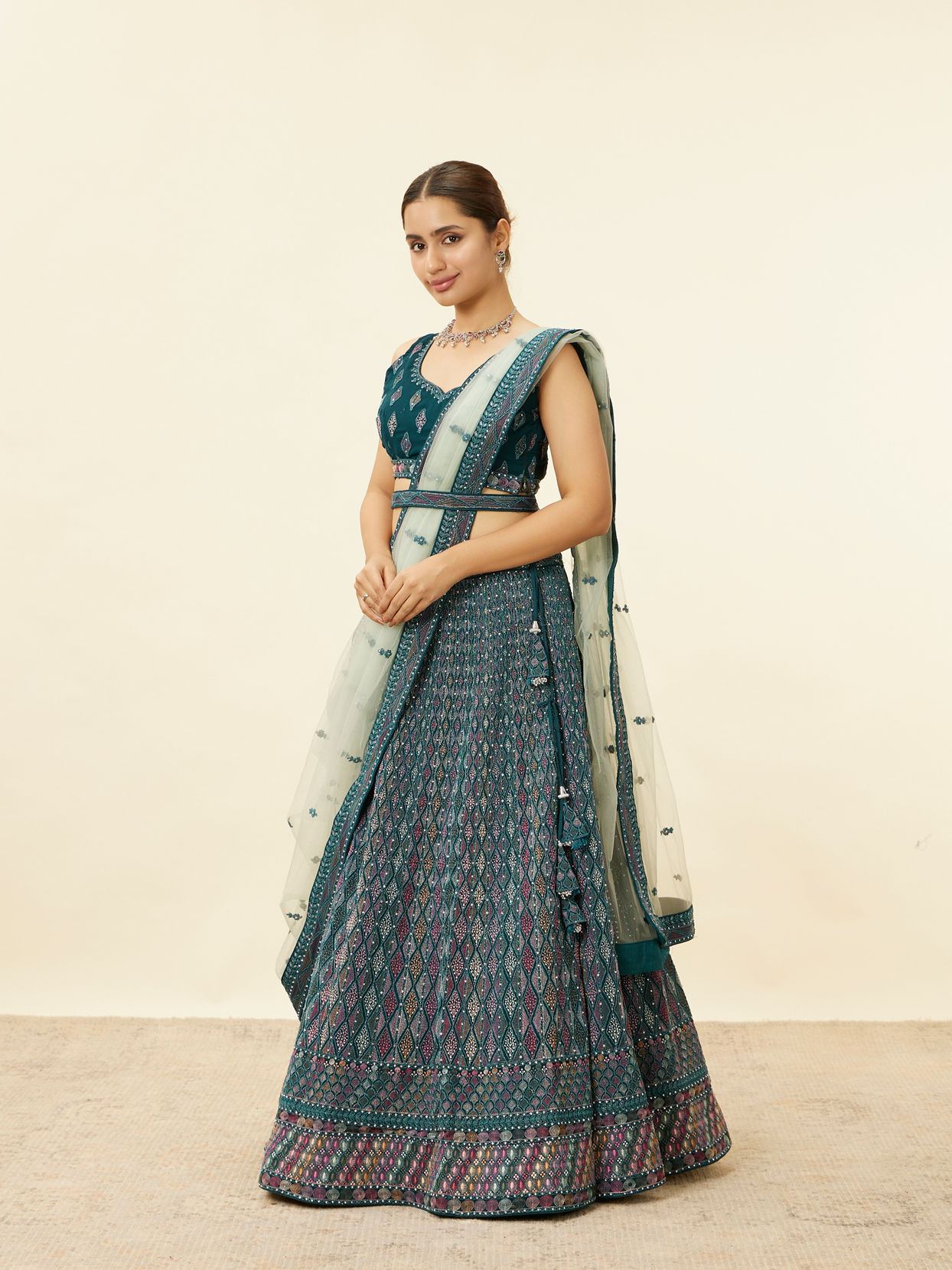 alt message - Mohey Women Teal Blue Harlequin Pattern Moti Work Lehenga image number 2