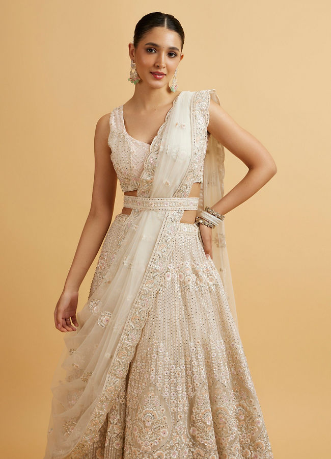 Mohey Women Dark Cream Floral Paisley Embroidered Bridal Lehenga with Round Trimmed Latkans