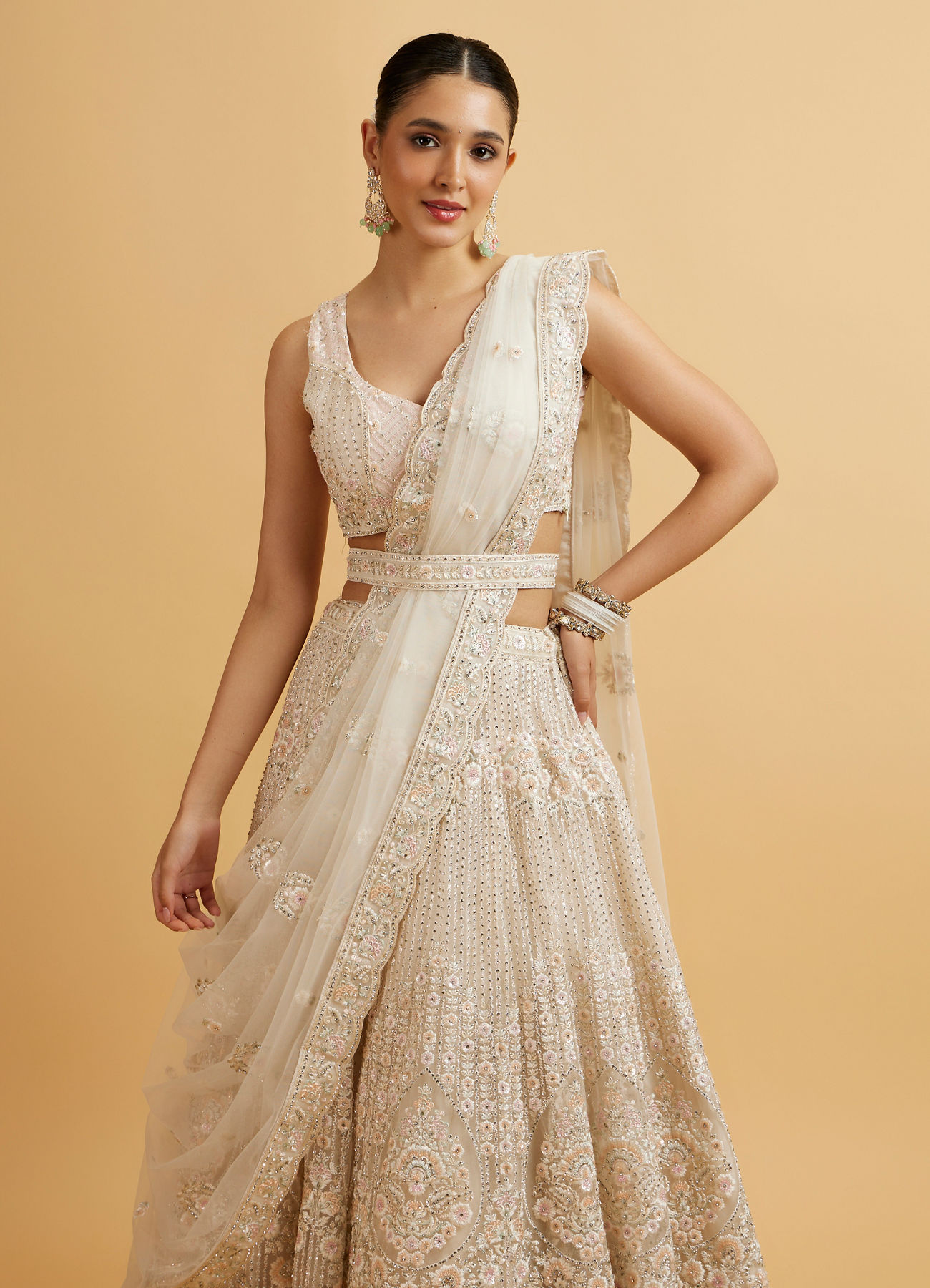 Mohey Women Dark Cream Floral Paisley Embroidered Bridal Lehenga with Round Trimmed Latkans