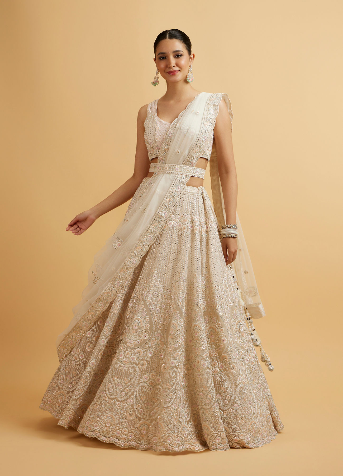 Mohey Women Dark Cream Floral Paisley Embroidered Bridal Lehenga with Round Trimmed Latkans