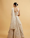 Mohey Women Dark Cream Floral Paisley Embroidered Bridal Lehenga with Round Trimmed Latkans