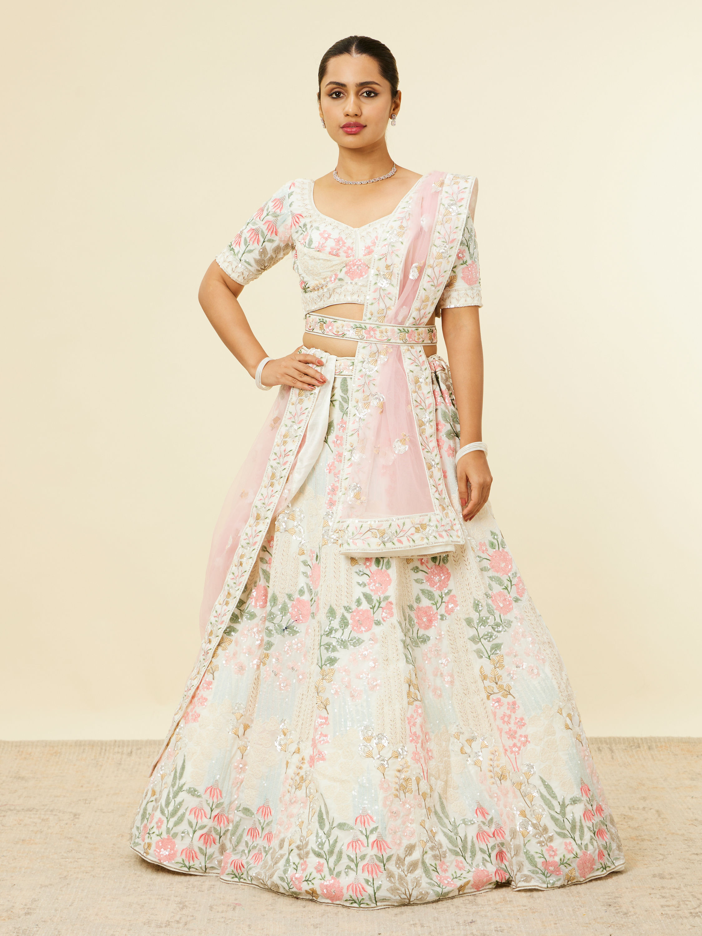 Mohey Women Cream Floral Sitara Embroidered Lehenga with Round Trimmed Latkans