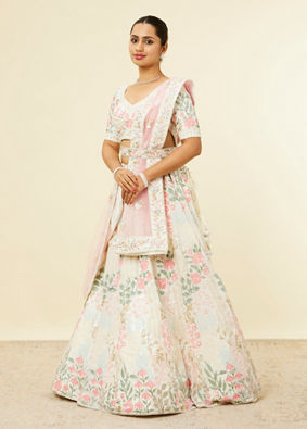 alt message - Mohey Women Cream Floral Sitara Embroidered Lehenga with Round Trimmed Latkans image number 2