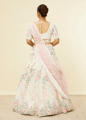 alt message - Mohey Women Cream Floral Sitara Embroidered Lehenga with Round Trimmed Latkans image number 4