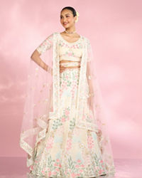 Mohey Women Cream Floral Sitara Embroidered Lehenga with Round Trimmed Latkans