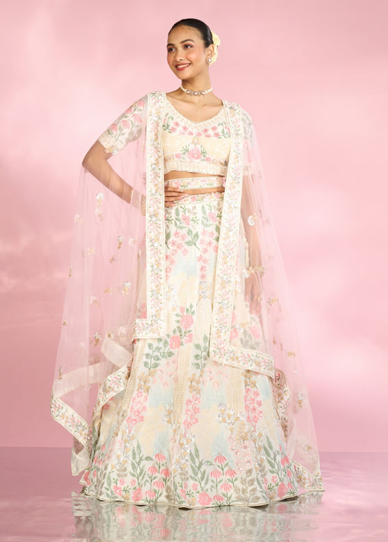 Mohey Women Cream Floral Sitara Embroidered Lehenga with Round Trimmed Latkans