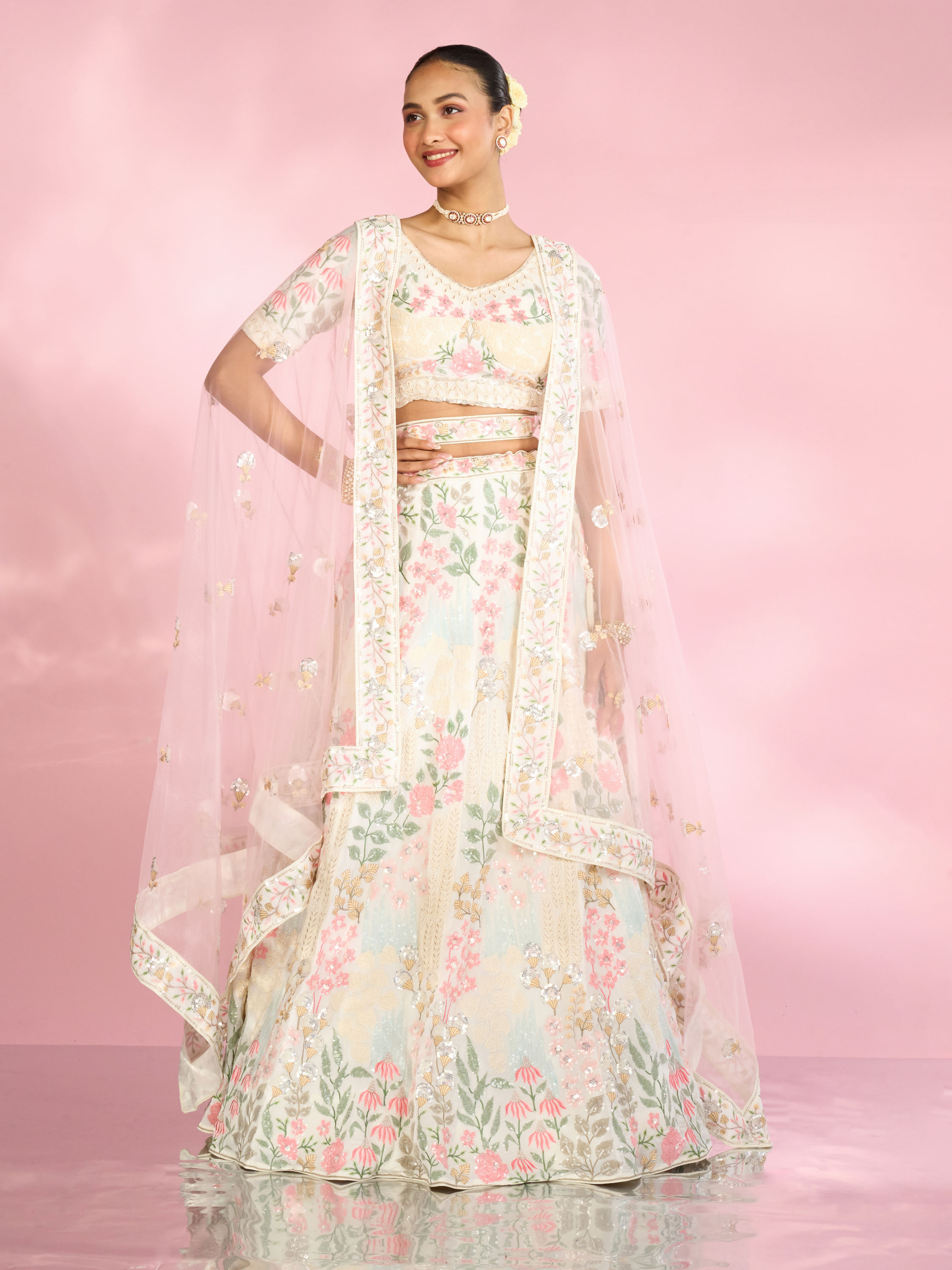 Mohey Women Cream Floral Sitara Embroidered Lehenga with Round Trimmed Latkans