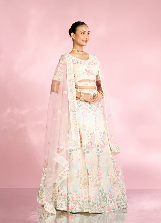 Mohey Women Cream Floral Sitara Embroidered Lehenga with Round Trimmed Latkans
