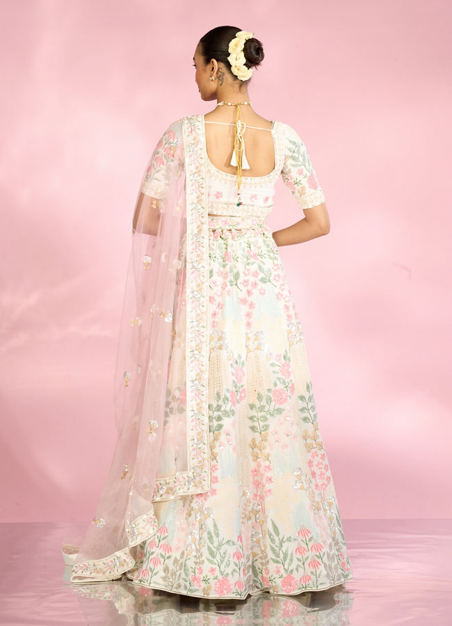 Mohey Women Cream Floral Sitara Embroidered Lehenga with Round Trimmed Latkans