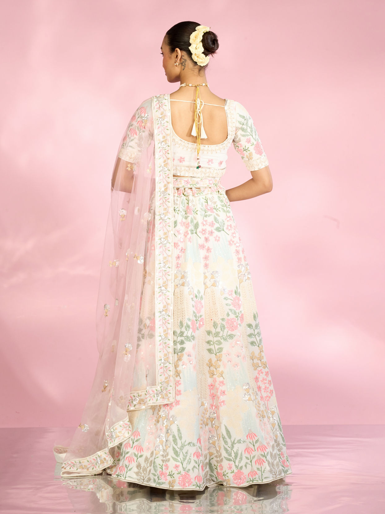 Mohey Women Cream Floral Sitara Embroidered Lehenga with Round Trimmed Latkans