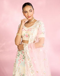 Mohey Women Cream Floral Sitara Embroidered Lehenga with Round Trimmed Latkans