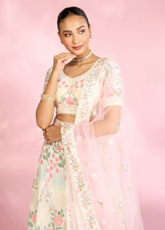 Mohey Women Cream Floral Sitara Embroidered Lehenga with Round Trimmed Latkans